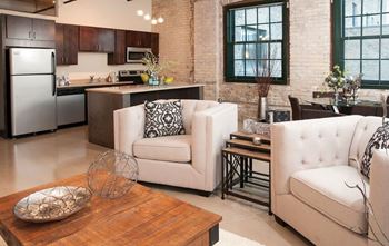 Exposed brick accents (select lofts)